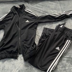 Adidas female track suit